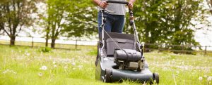 Homeowner mowing their lawn